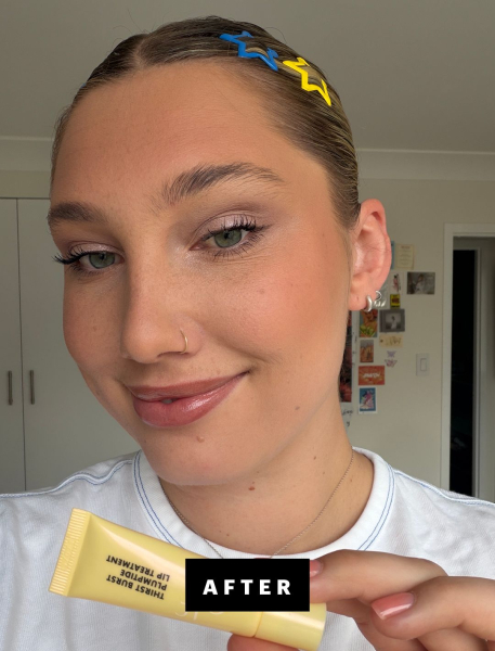 Katie Gunderman holding up lip balm